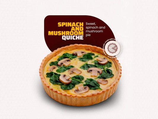 Spinach and mushroom quiche with packaging label on a white background